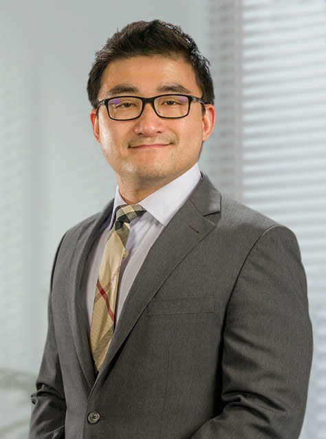 headshot of dr hanbing zhou orthopedic spine surgeon from Connecticut